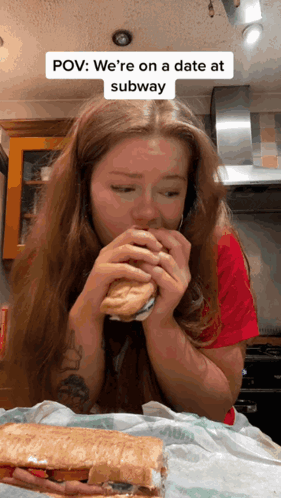 A Woman Is Eating A Subway Sandwich With A Caption That Says Pov We 'Re On A Date At Subway GIF