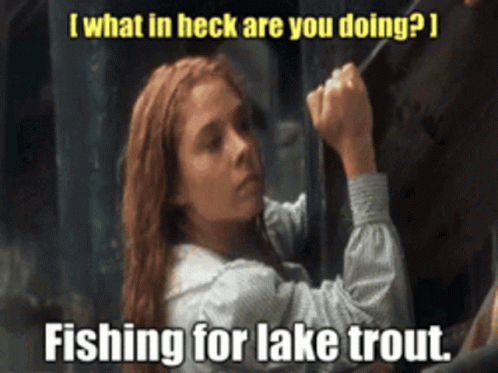 A Woman Is Fishing For A Lake Trout With A Caption That Says " What In Heck Are You Doing " GIF