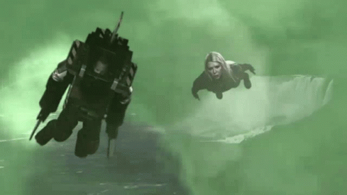 A Woman Is Flying In The Air Next To A Robot GIF
