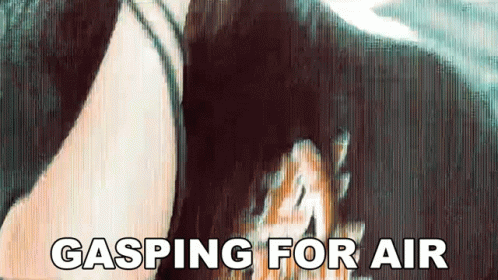 A Woman Is Gasping For Air While Holding A Dog 'S Head GIF