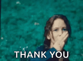 A Woman Is Giving A Middle Finger And Saying Thank You . GIF