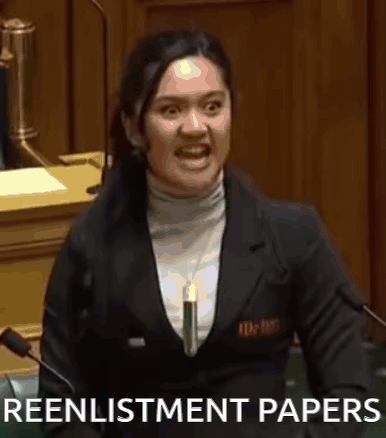A Woman Is Giving A Speech In A Parliament And Holding A Piece Of Paper In Her Hand . GIF