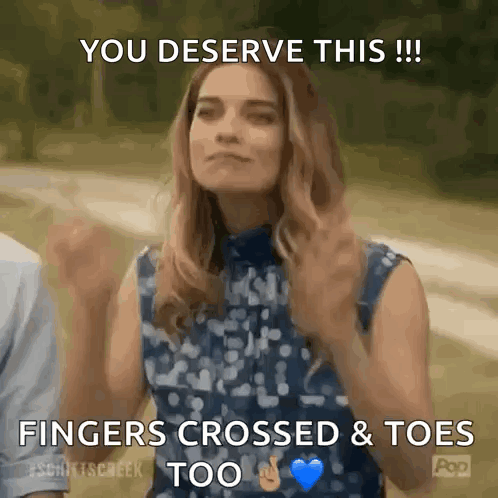 A Woman Is Giving A Thumbs Up With The Words You Deserve This Fingers Crossed & Toes Too GIF