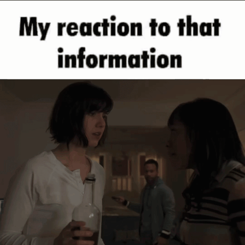 A Woman Is Holding A Bottle Of Wine And Talking To Another Woman GIF