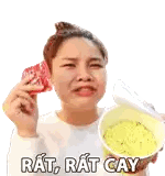 a woman is holding a bowl of noodles and a piece of meat .