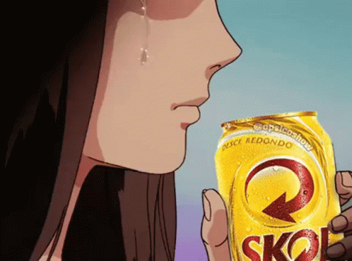 a woman is holding a can of skol beer