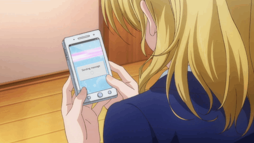 A Woman Is Holding A Cell Phone That Says Sending Message On The Screen GIF