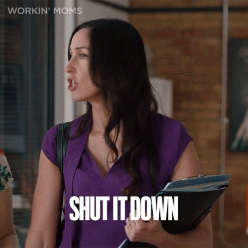 A Woman Is Holding A Clipboard And Says Shut It Down GIF
