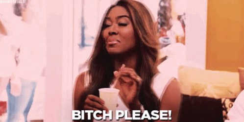 a woman is holding a cup in her hand and says bitch please