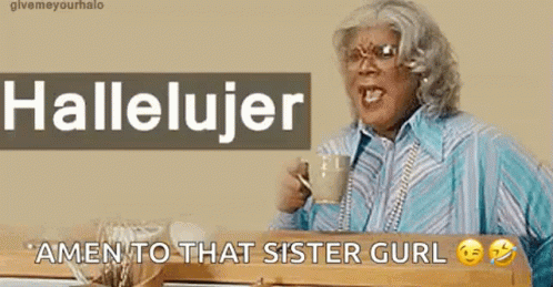 A Woman Is Holding A Cup Of Coffee And Saying Amen To That Sister Gurl GIF