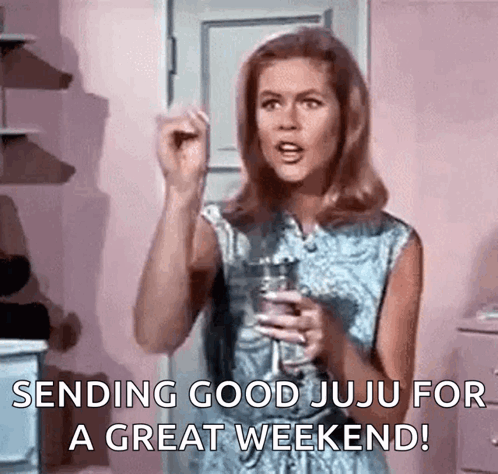 A Woman Is Holding A Glass Of Wine And Making A Funny Face . GIF