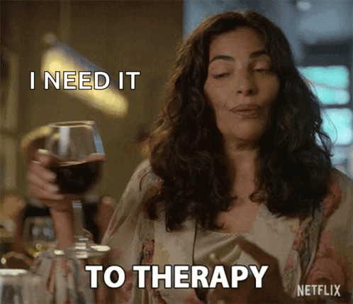 A Woman Is Holding A Glass Of Wine And Saying I Need It To Therapy GIF