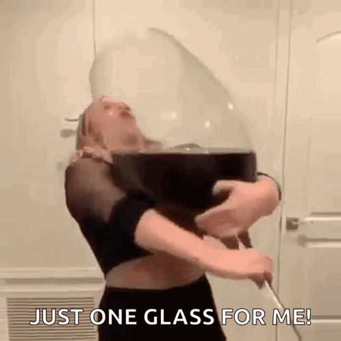 A Woman Is Holding A Glass Of Wine In Her Hands And Says `` Just One Glass For Me '' . GIF