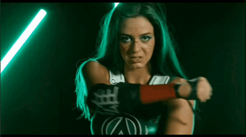 Woman Holding Green Lightsaber And Screaming GIF