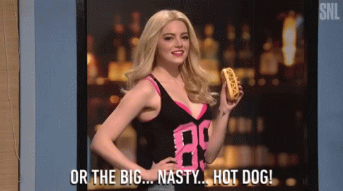 A Woman Is Holding A Hot Dog And Says Or The Big Nasty Hot Dog GIF