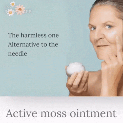 A Woman Is Holding A Jar Of Active Moss Ointment In Her Hands GIF