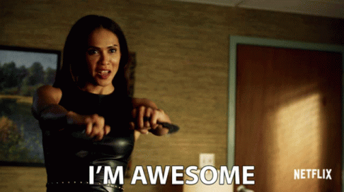 A Woman Is Holding A Knife And Says I 'M Awesome In Front Of A Netflix Logo GIF