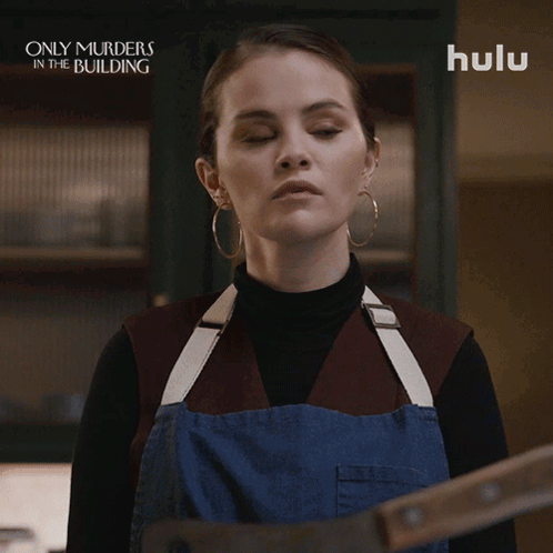 A Woman Is Holding A Large Knife And Says Fine I 'Ll Do It GIF