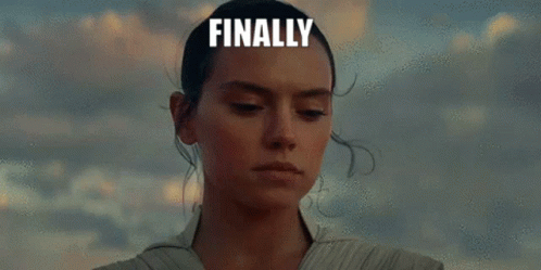 A Woman Is Holding A Lightsaber In Her Hand With The Words `` Finally Pee Lightsaber '' Written On It . GIF