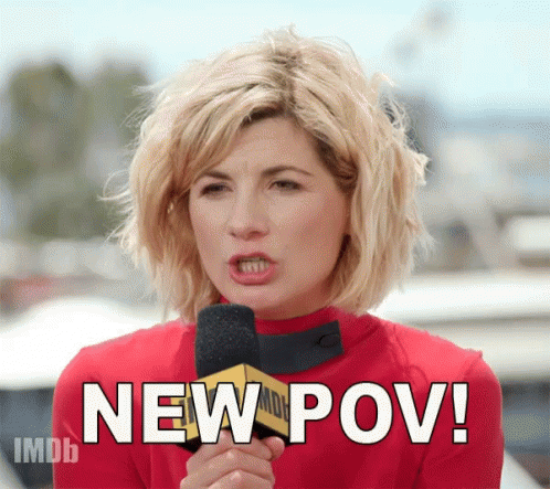 A Woman Is Holding A Microphone And Saying New Pov GIF