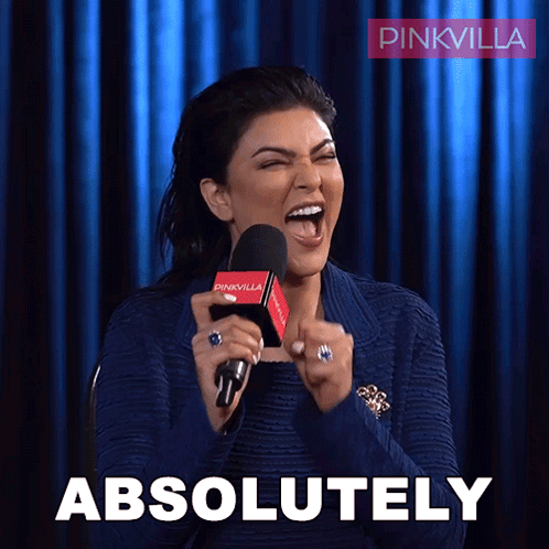 A Woman Is Holding A Microphone And The Word Absolutely Is On The Bottom GIF