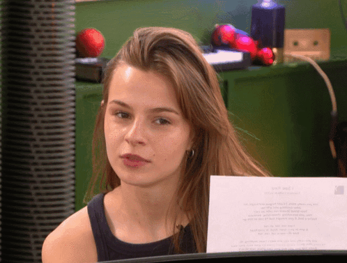 Woman Holding Paper Saying Diet Plan GIF