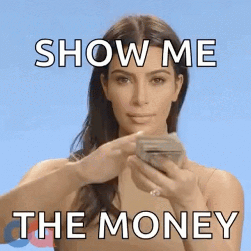 A Woman Is Holding A Stack Of Money In Her Hands . GIF