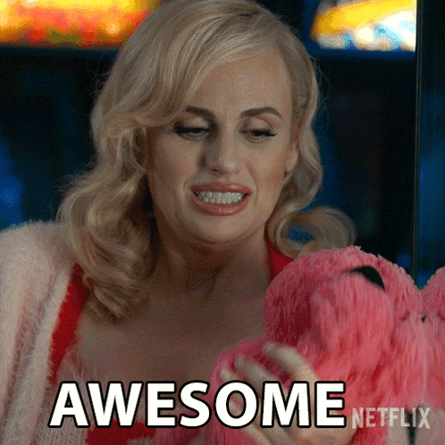 A Woman Is Holding A Stuffed Flamingo And Says Awesome Netflix On The Bottom GIF