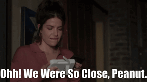 A Woman Is Holding A Tablet And Says " Ohh! We Were So Close, Peanut " GIF
