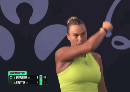 a woman is holding a tennis racquet in front of a championship point