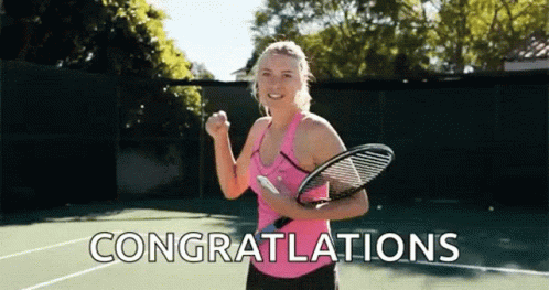 A Woman Is Holding A Tennis Racquet On A Tennis Court And Says Congratulations . GIF