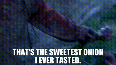 A Woman Is Holding An Onion And Saying That 'S The Sweetest Onion I Ever Tasted GIF