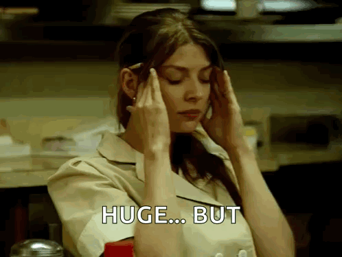 A Woman Is Holding Her Head In Pain And Says Huge But GIF