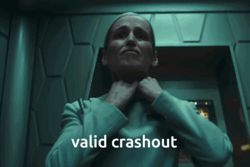A Woman Is Holding Her Neck With The Words Valid Crashout Written Below Her GIF