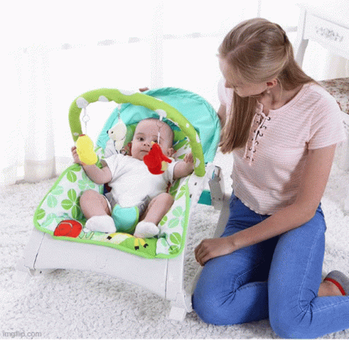 A Woman Is Kneeling Next To A Baby In A Bouncer That Says Imgflip.com On The Bottom GIF