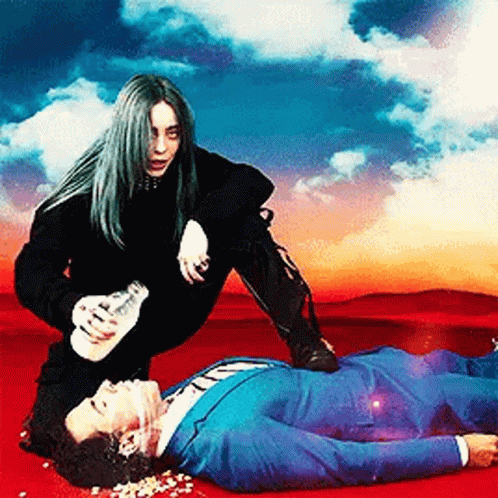 Woman Kneeling Over Laying Man In Suit GIF