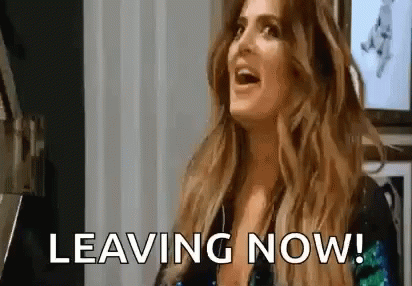 A Woman Is Laughing And Saying `` Leaving Now '' . GIF