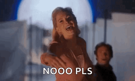 A Woman Is Laughing And Saying Nooo Pls While A Man Stands Behind Her . GIF