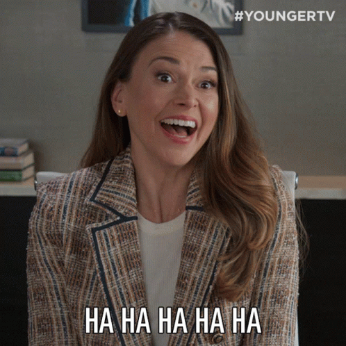 a woman is laughing and says ha ha ha ha