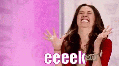 A Woman Is Laughing With Her Hands In The Air And The Word Eeeek Is Written On The Screen Behind Her . GIF