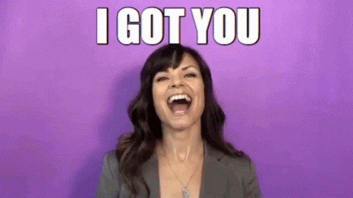 A Woman Is Laughing With Her Mouth Open And The Words `` I Got You '' Written Above Her . GIF