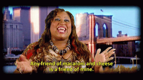 A Woman Is Laughing With The Words Any Friend Of Macaroni And Cheese Is A Friend Of Mine GIF