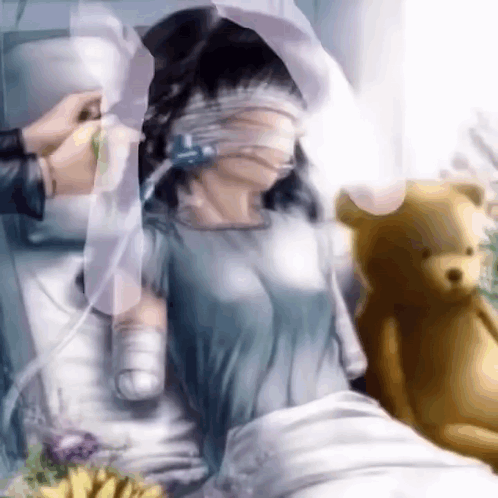 A Woman Is Laying In A Hospital Bed With A Teddy Bear Next To Her GIF