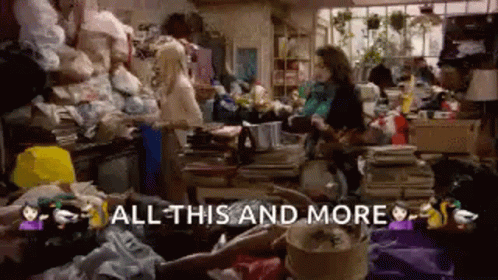 A Woman Is Laying In A Messy Room With The Words `` All This And More '' Written Above Her . GIF