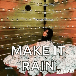 A Woman Is Laying In A Pile Of Money With The Words Make It Rain GIF