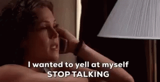 Woman Talking On Phone While Lying On Bed GIF