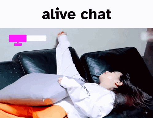 A Woman Is Laying On A Couch With A Pillow And The Words Alive Chat Above Her GIF