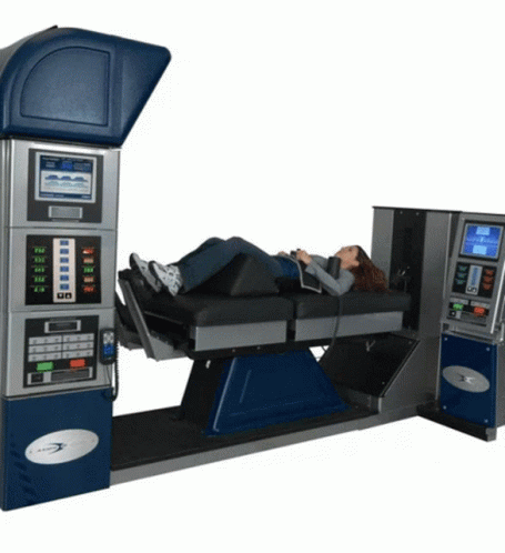 A Woman Is Laying On A Machine That Has A Display That Says ' Sd ' On It GIF