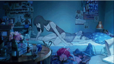 A Woman Is Laying On Top Of A Man On A Bed In A Room With Posters On The Wall That Say Favorite GIF