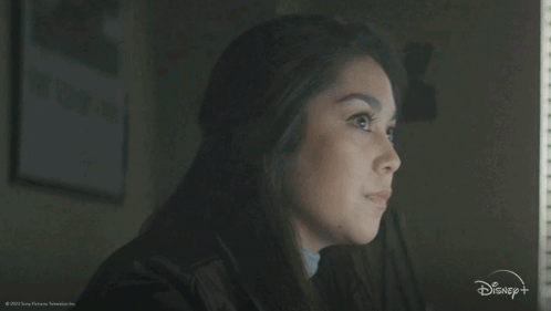 A Woman Is Looking Out A Window With The Words " For Real " In Front Of Her GIF